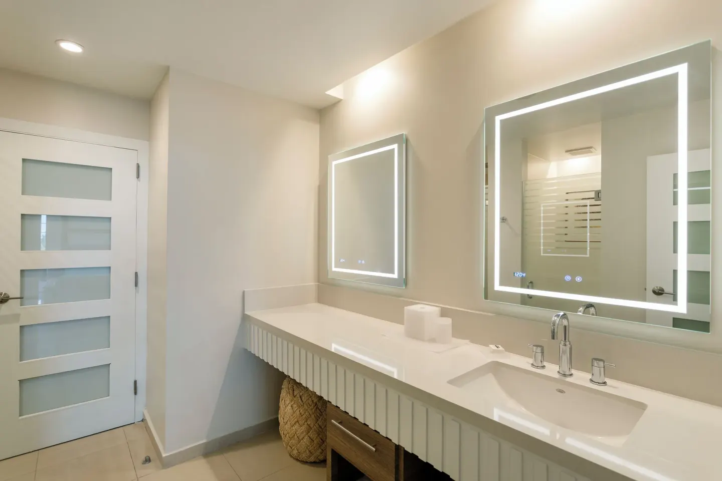 Premier Villa bathroom double vanity with illuminated mirrors at Hyatt Regency Grand Reserve Puerto Rico.