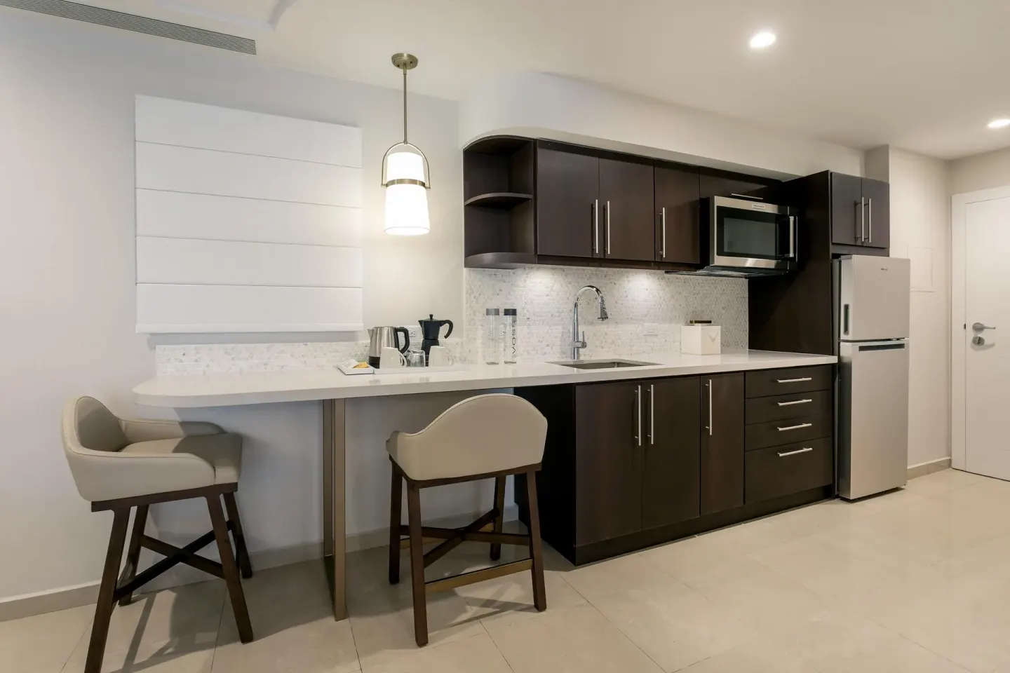 Premier Villa kitchenette with bar seating at Hyatt Regency Grand Reserve Puerto Rico.