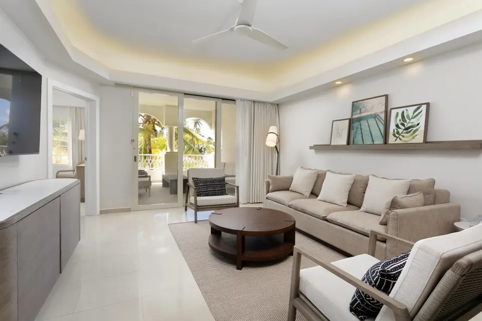 Premier Villa living room with sofa and balcony at Hyatt Regency Grand Reserve Puerto Rico.