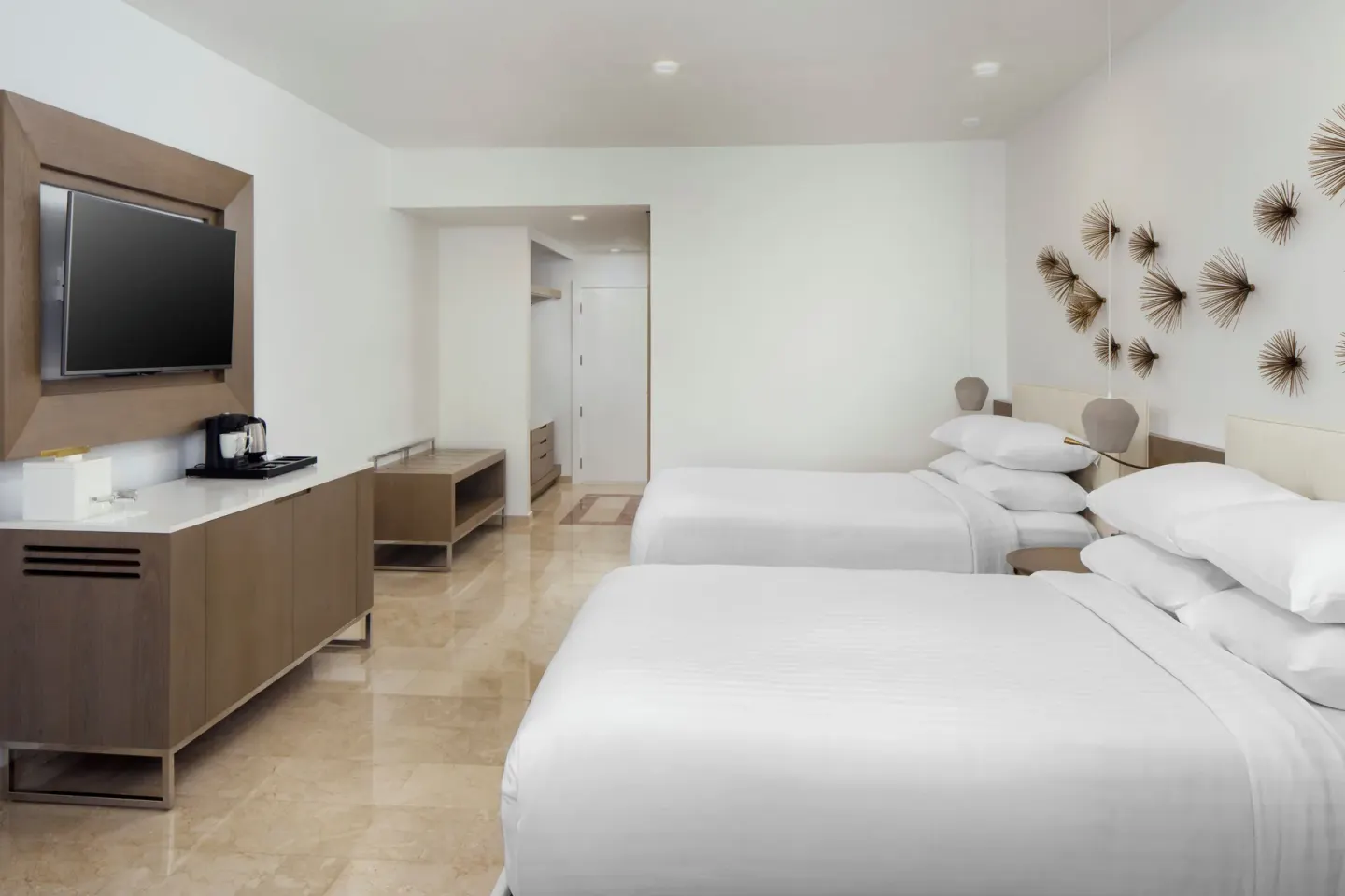 Accessible room with two beds, TV and entry area at Hyatt Regency Grand Reserve Puerto Rico.