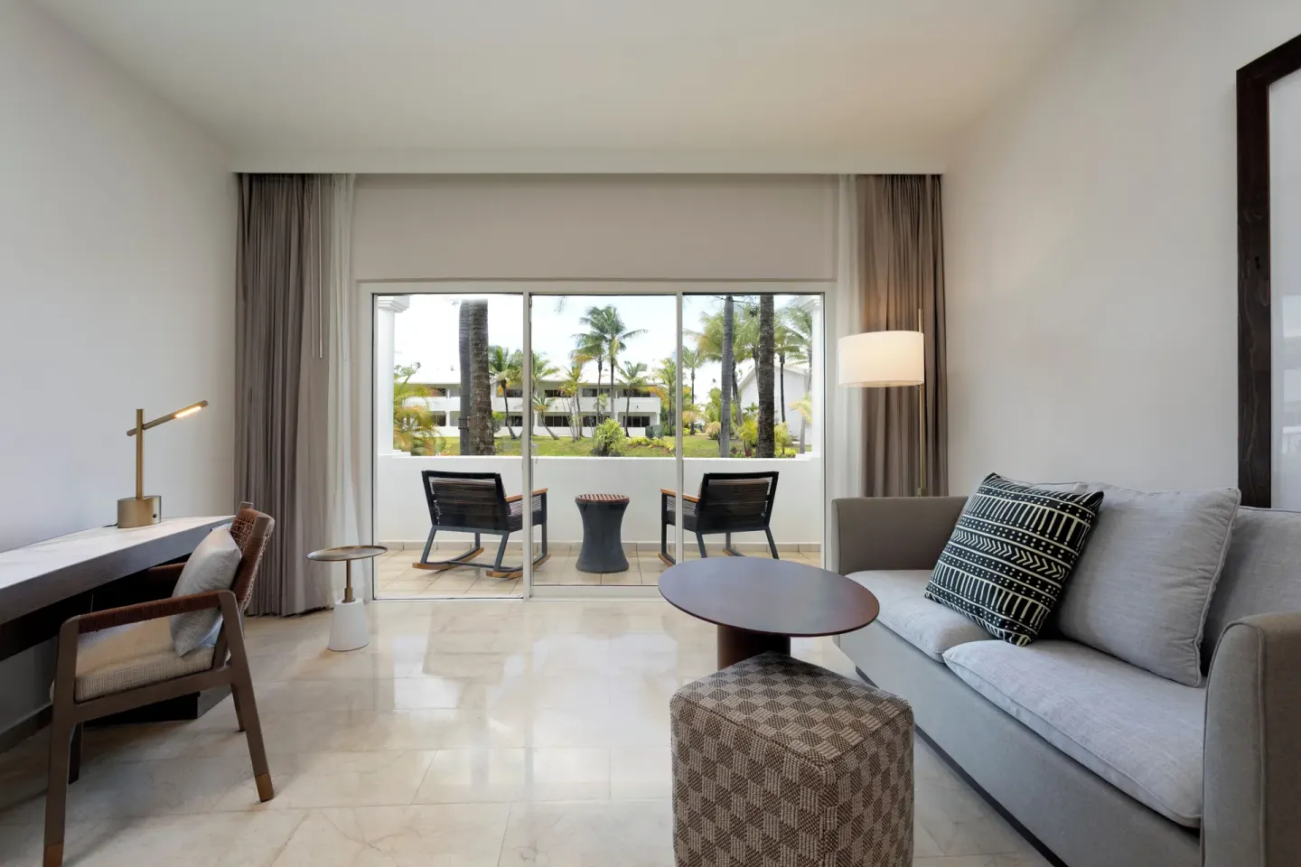 Garden View Room sitting area and balcony at Hyatt Regency Grand Reserve Puerto Rico.