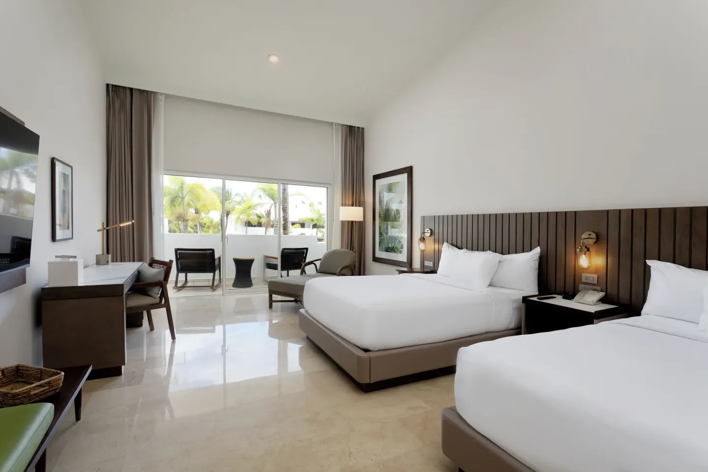 Garden View Room with two beds, desk and balcony at Hyatt Regency Grand Reserve Puerto Rico.