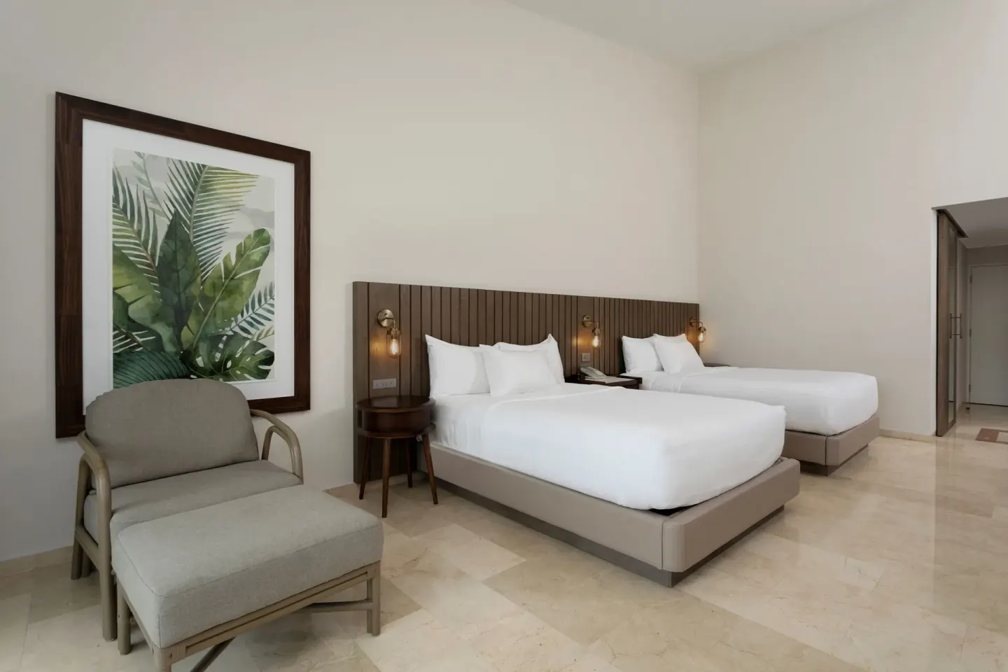Garden View Room with two beds and lounge chair at Hyatt Regency Grand Reserve Puerto Rico.