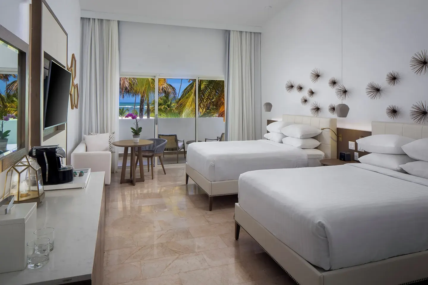 Ocean View room with two beds and sitting area at Hyatt Regency Grand Reserve Puerto Rico.