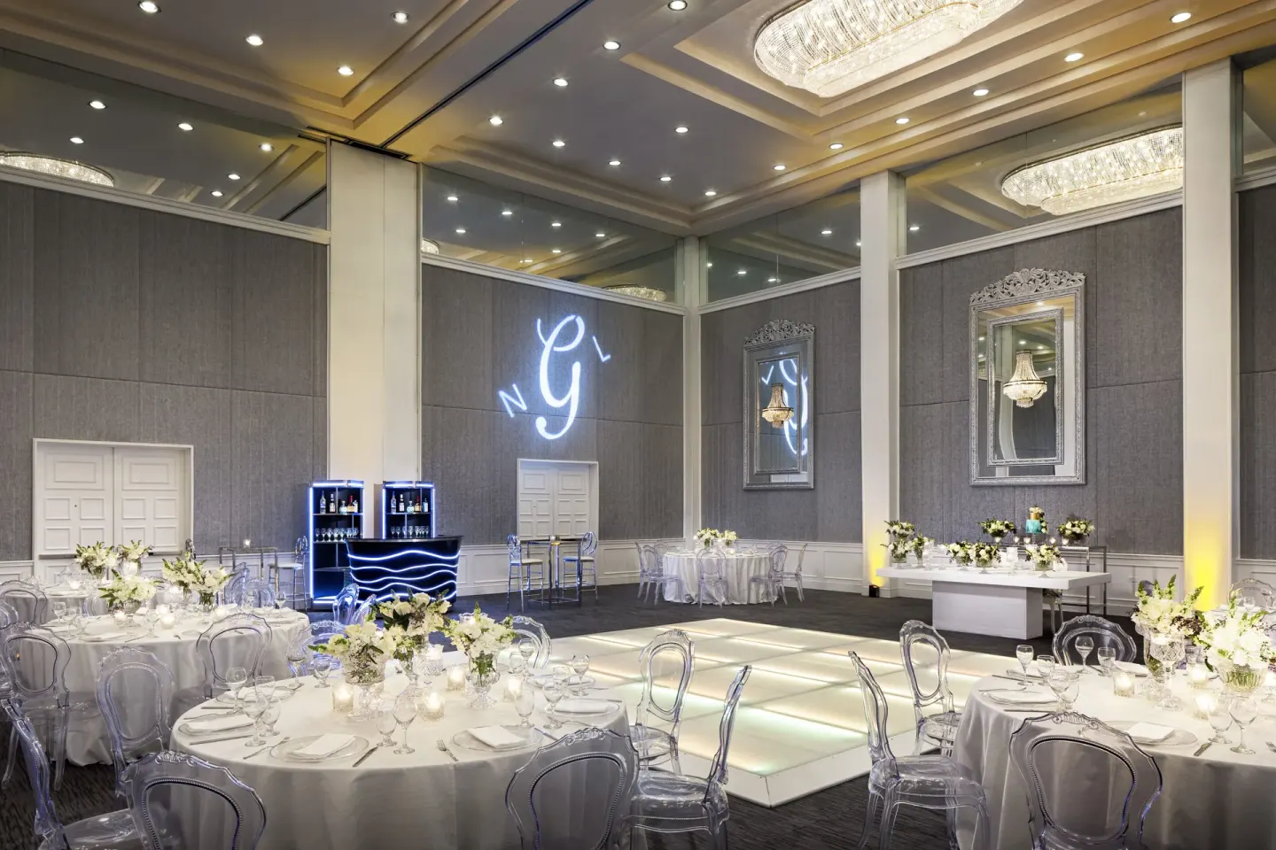 Elegant ballroom reception setup at Hyatt Regency Grand Reserve Puerto Rico with round tables and dance floor.