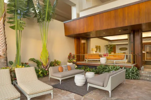 Private patio with loungers and suite interior at Hyatt Regency Maui Resort & Spa.
