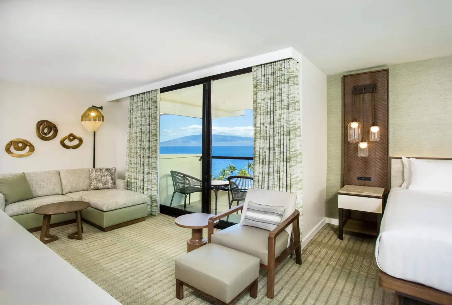 King guest room with sofa, balcony, and ocean view at Hyatt Regency Maui Resort & Spa.
