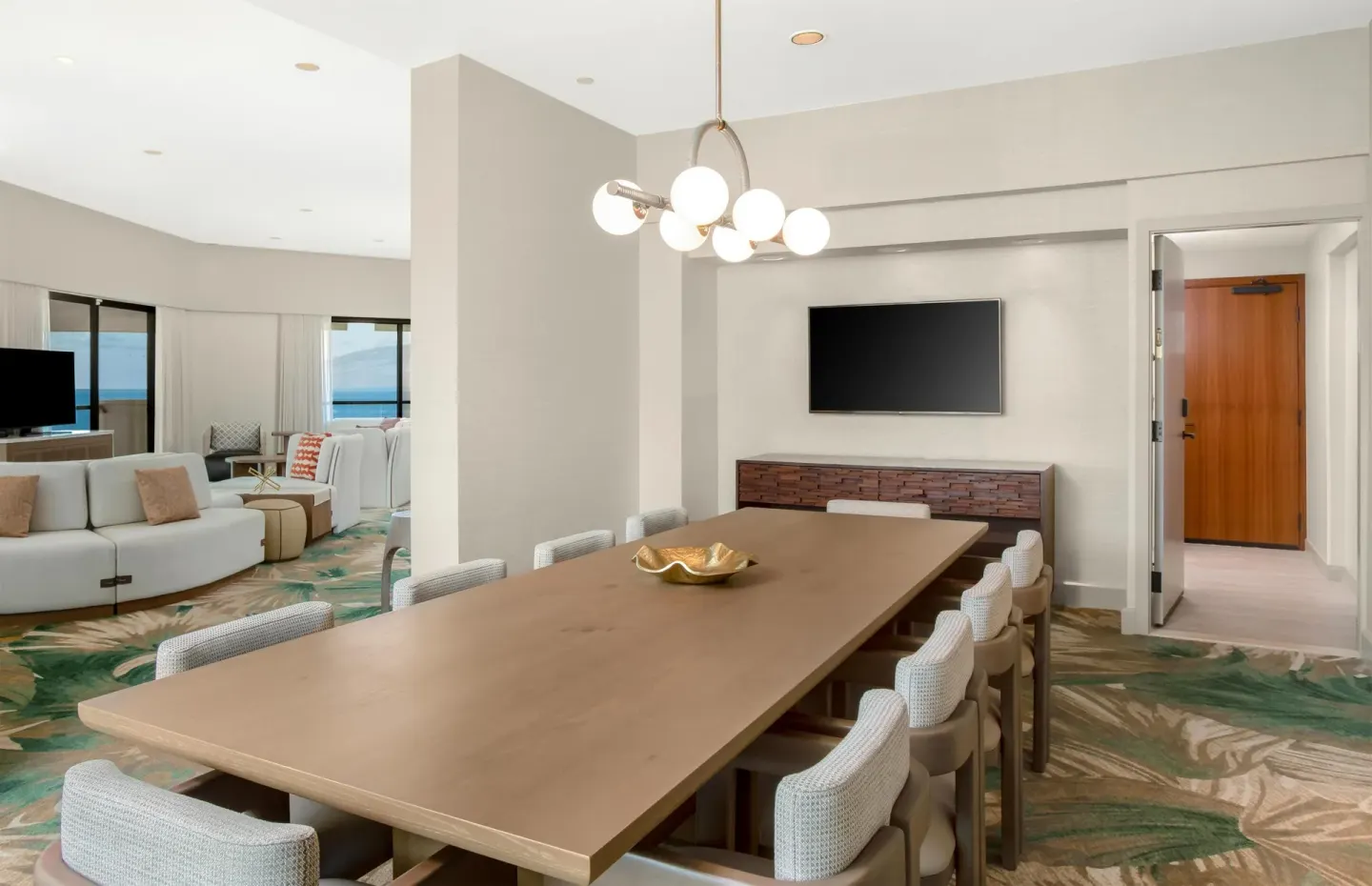 Suite dining and living area with ocean-view windows at Hyatt Regency Maui Resort & Spa.