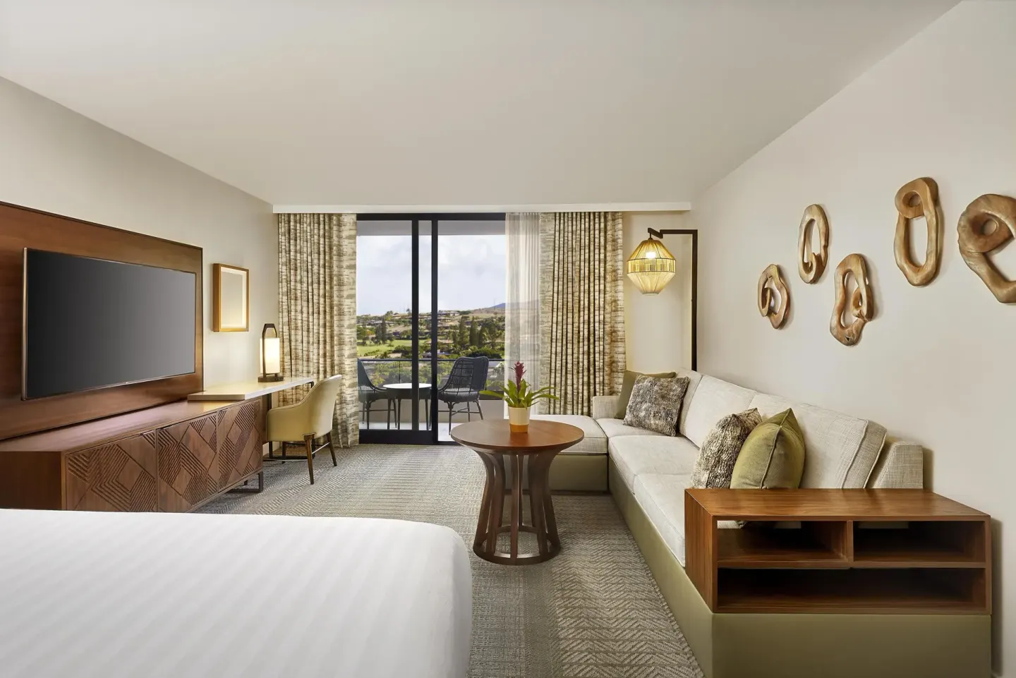 Mountain View king room with sofa and balcony at Hyatt Regency Maui Resort & Spa.