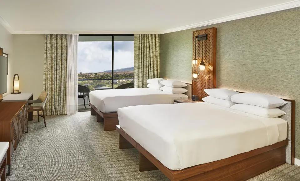 Two-bed mountain view guest room at Hyatt Regency Maui Resort & Spa with balcony and desk.