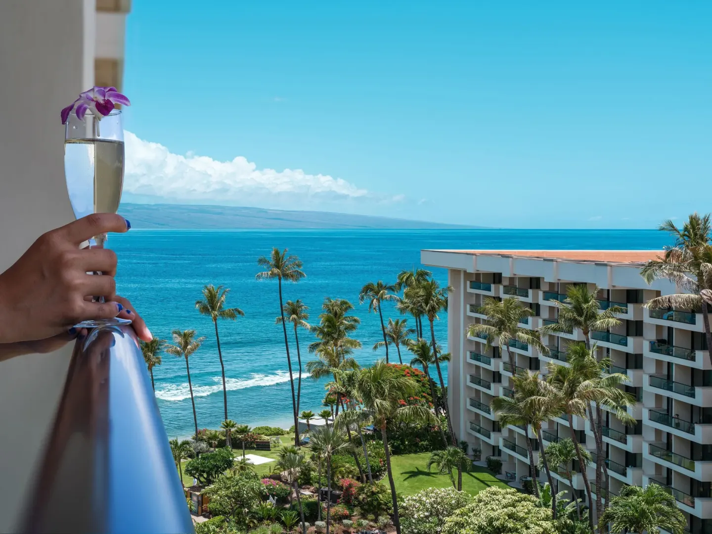 Balcony ocean view with a drink at Hyatt Regency Maui Resort & Spa.