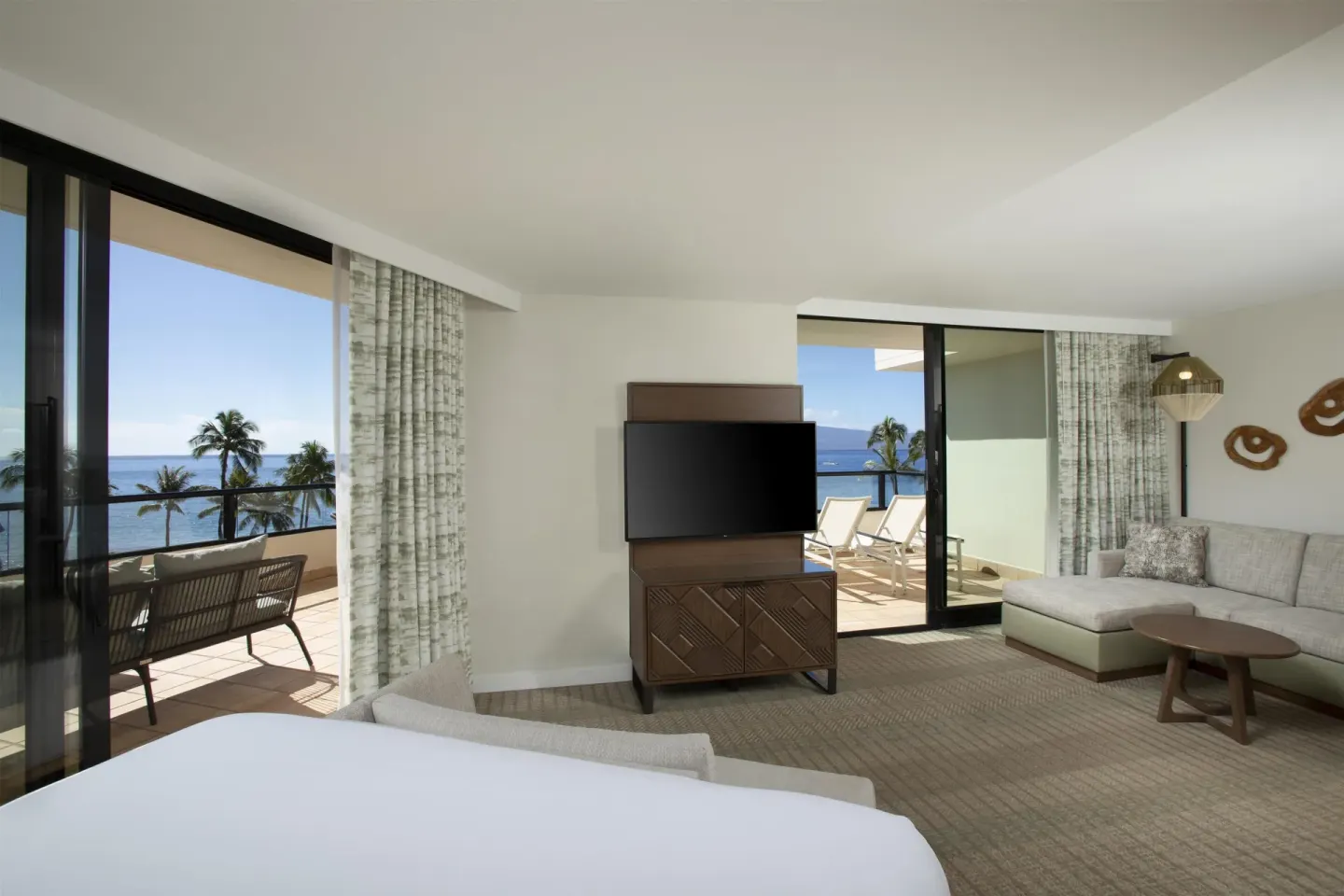 Corner ocean view room with two balcony doors at Hyatt Regency Maui Resort & Spa.