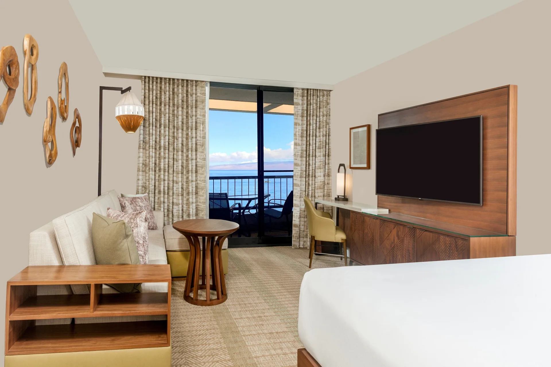 Oceanfront room with sofa bed and balcony view at Hyatt Regency Maui Resort & Spa.
