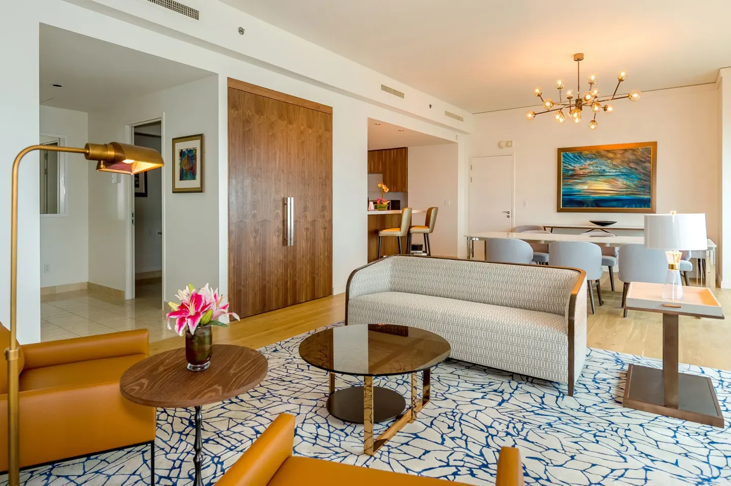 Suite lounge with sofa, armchairs and dining area at Hyatt Regency Trinidad.