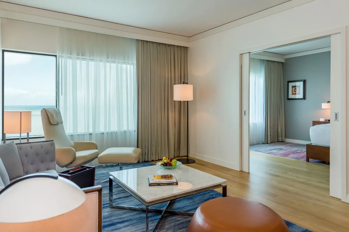 Regency Suite living area and king bedroom at Hyatt Regency Trinidad.