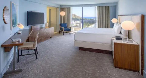 King-bed guest room with Diamond Head view at Hyatt Regency Waikiki Beach Resort & Spa.