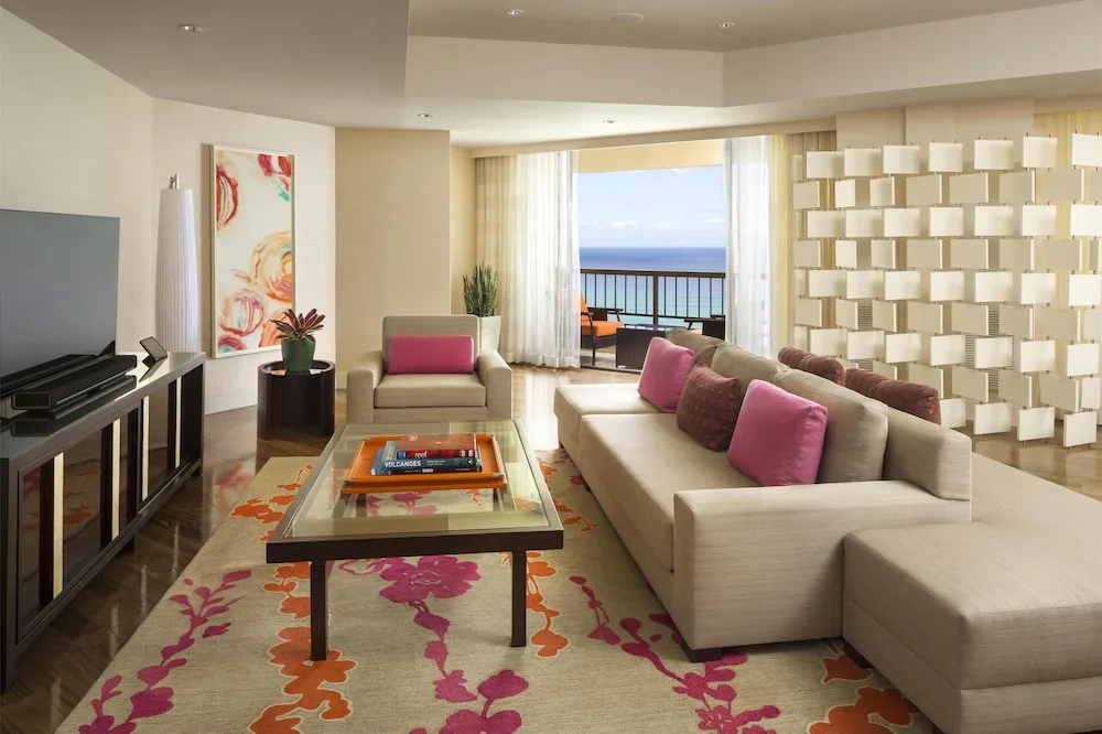 Ocean-view suite living room at Hyatt Regency Waikiki Beach Resort & Spa.