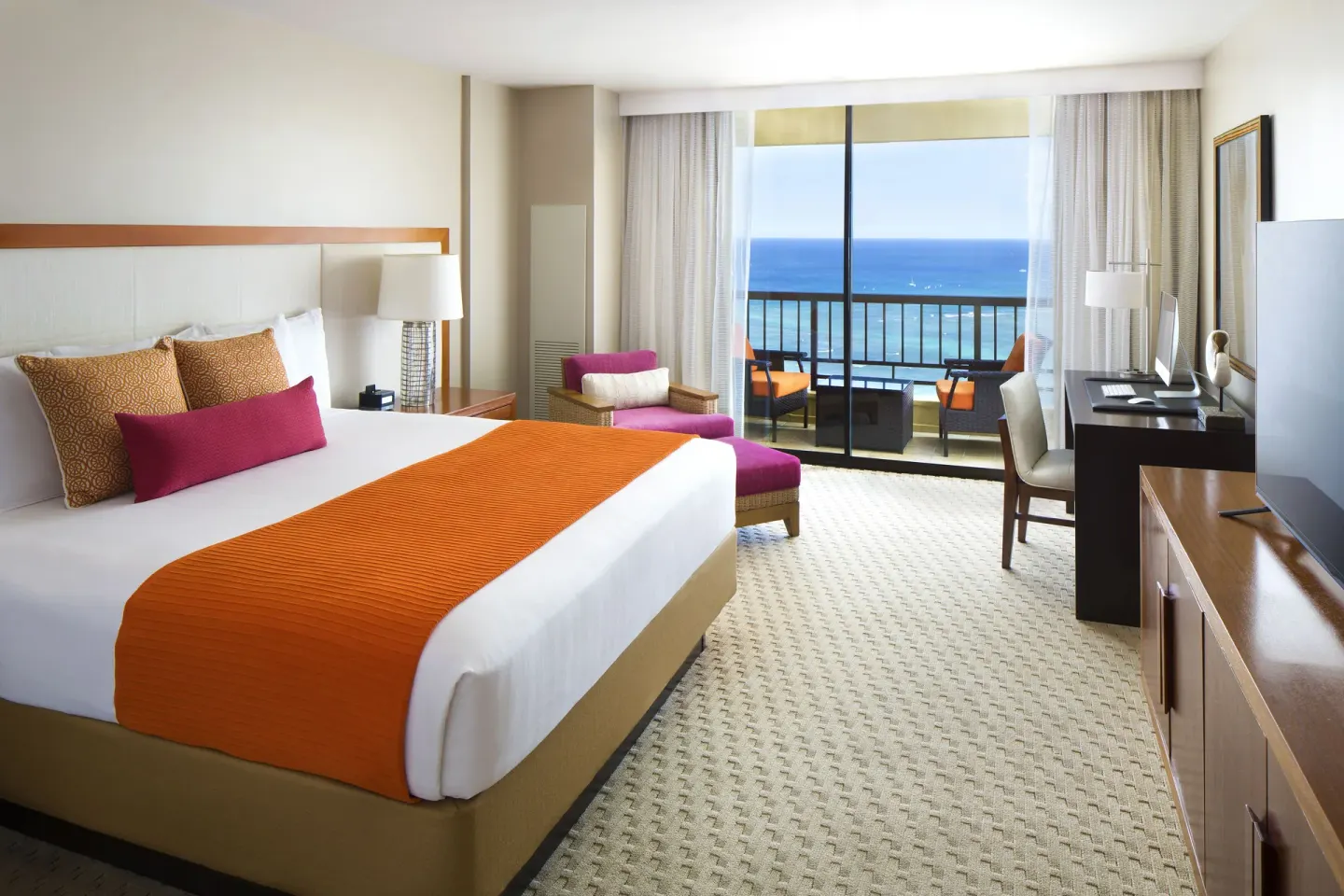 Penthouse suite king bedroom with ocean-view balcony at Hyatt Regency Waikiki Beach Resort & Spa.