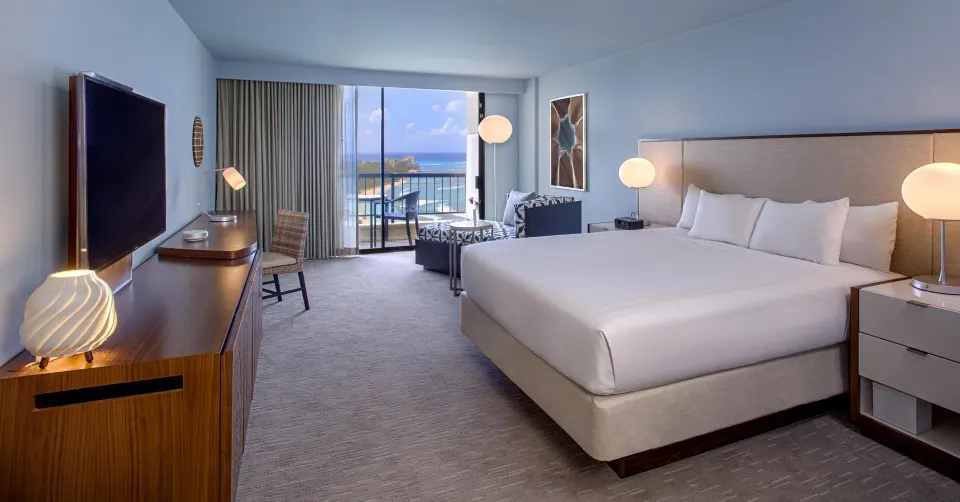 King oceanfront room with chaise and balcony at Hyatt Regency Waikiki Beach Resort & Spa.