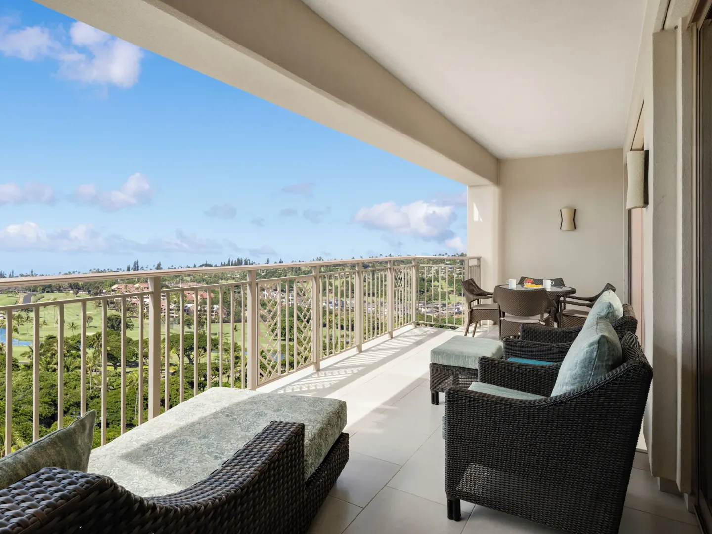 Covered balcony with lounge seating at Hyatt Vacation Club at Ka'anapali Beach.