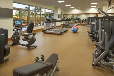 Fitness center with treadmills, bikes, weights, and strength machines at Hyatt Vacation Club at Ka'anapali Beach.