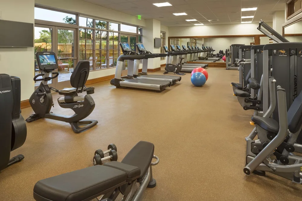Fitness center with treadmills, bikes, weights, and strength machines at Hyatt Vacation Club at Ka'anapali Beach.