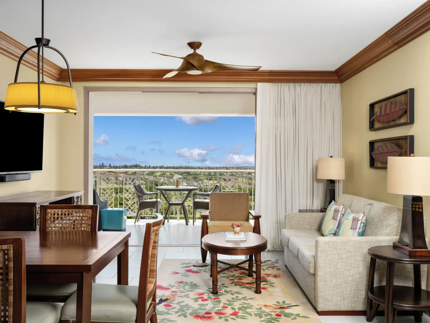 Living and dining space with open balcony at Hyatt Vacation Club at Ka'anapali Beach.
