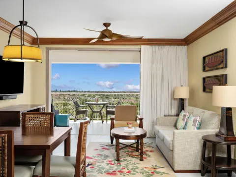 Living and dining space with open balcony at Hyatt Vacation Club at Ka'anapali Beach.