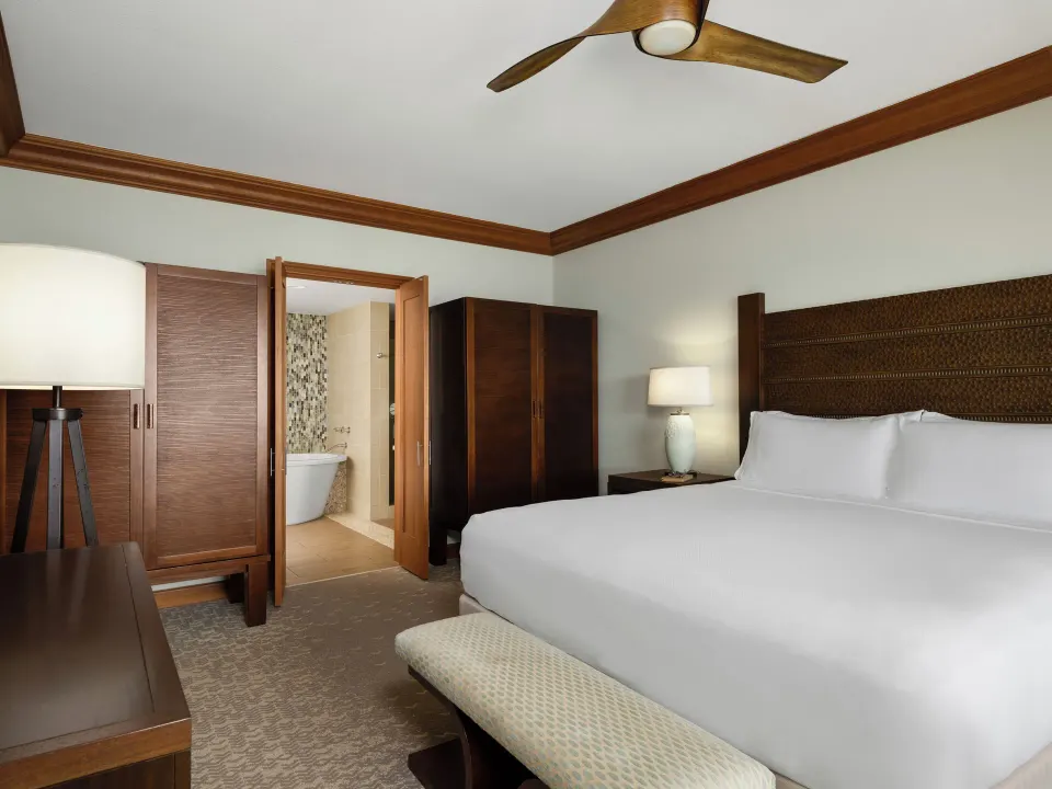 King bedroom with bathroom entry in a villa at Hyatt Vacation Club at Ka'anapali Beach.
