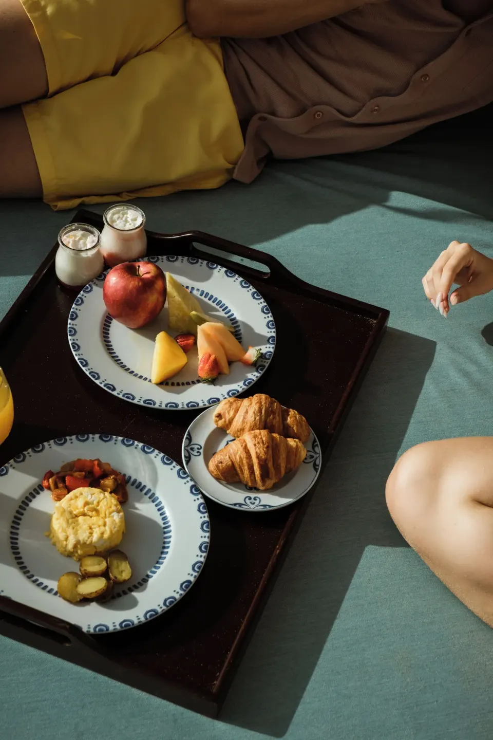 Breakfast tray with fruit, eggs and croissants at Iberostar Selection Bávaro Suites.