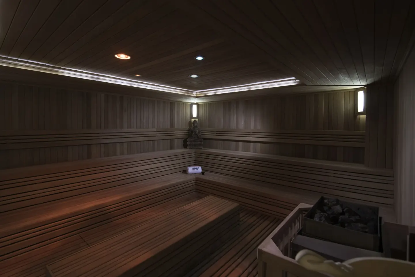 Wood-lined sauna with tiered benches at Iberostar Selection Bávaro Suites.