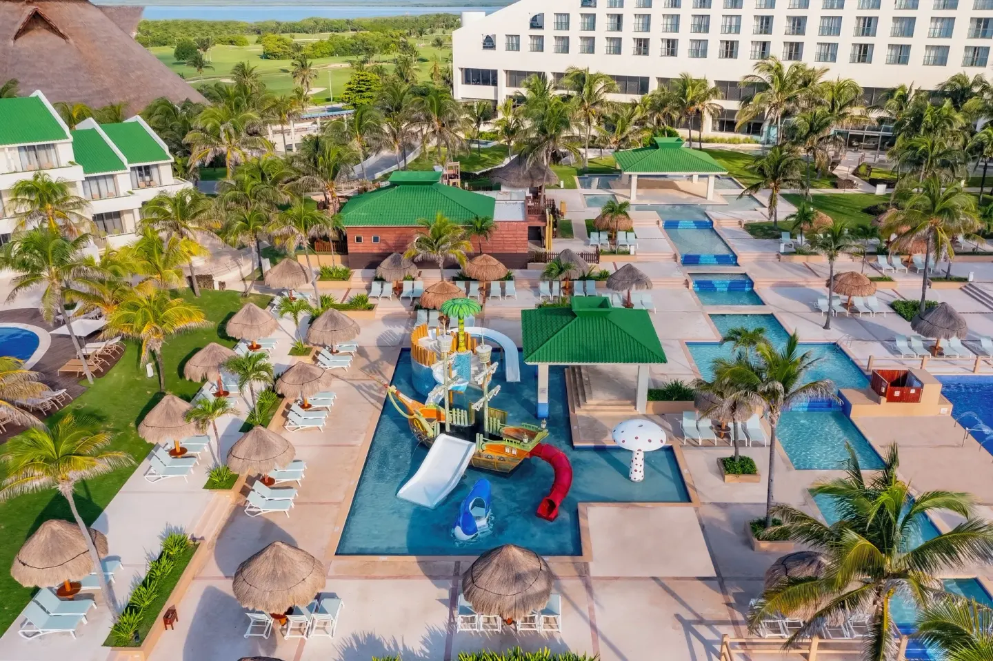 Aerial view of the children’s pool and resort grounds at Iberostar Selection Cancún.