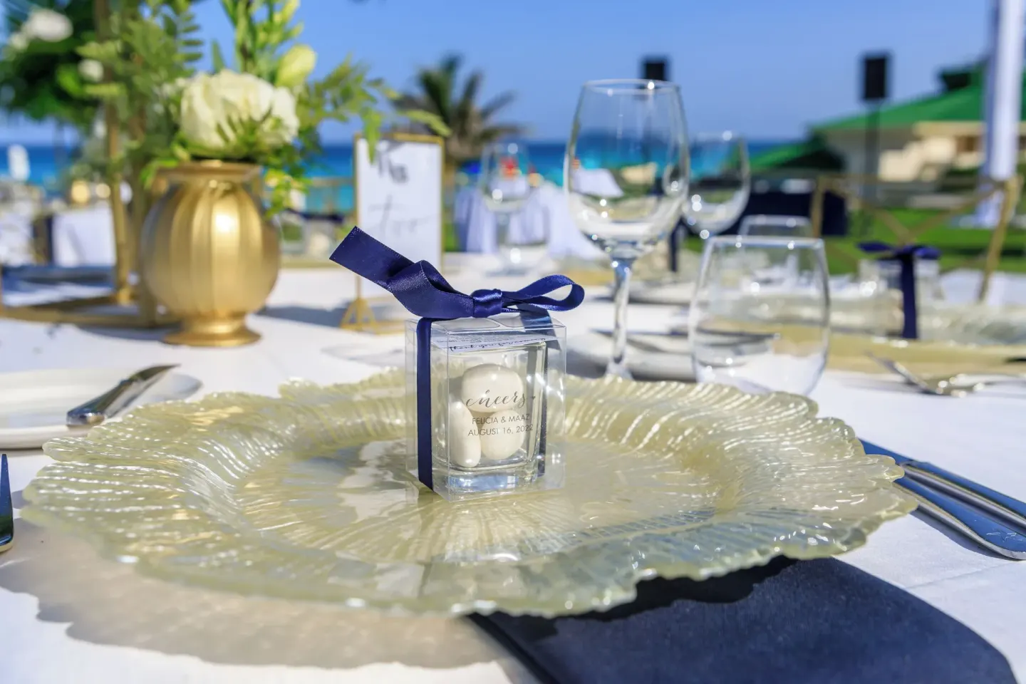 Beachfront event table setting with ocean backdrop at Iberostar Selection Cancún.