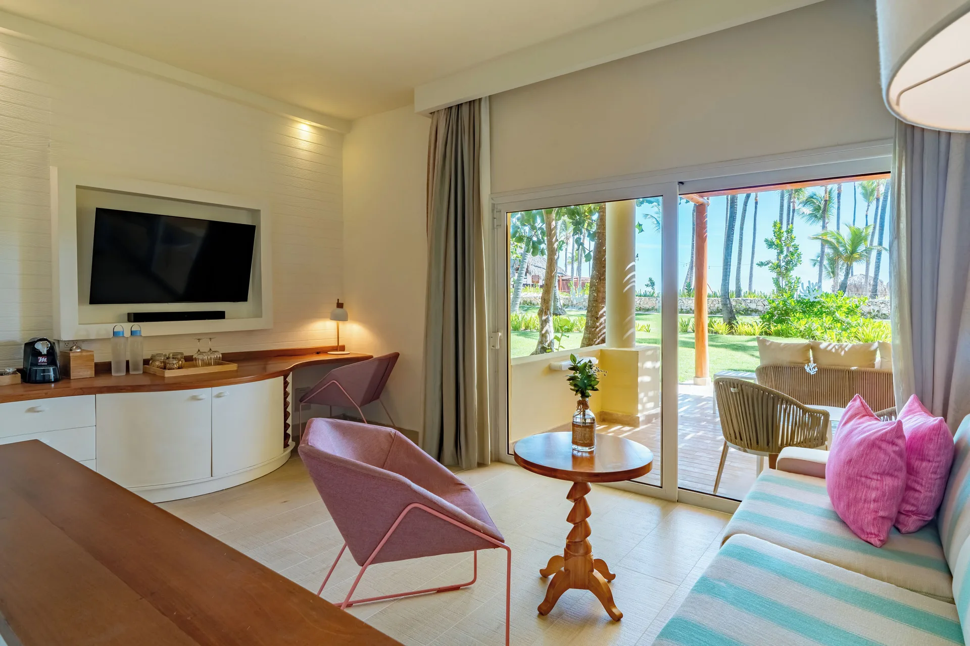 Guest room sitting area and terrace at Iberostar Selection Coral Bávaro.
