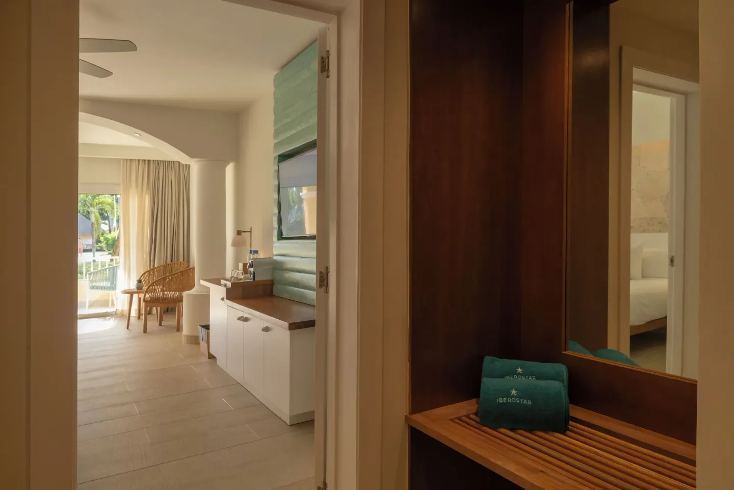 Guest room entry and seating area at Iberostar Selection Hacienda Dominicus.