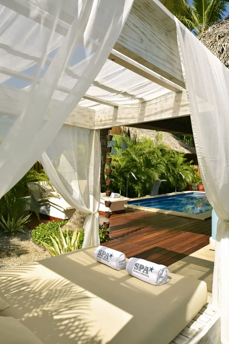 Outdoor spa cabana beside a small pool at Iberostar Selection Hacienda Dominicus.