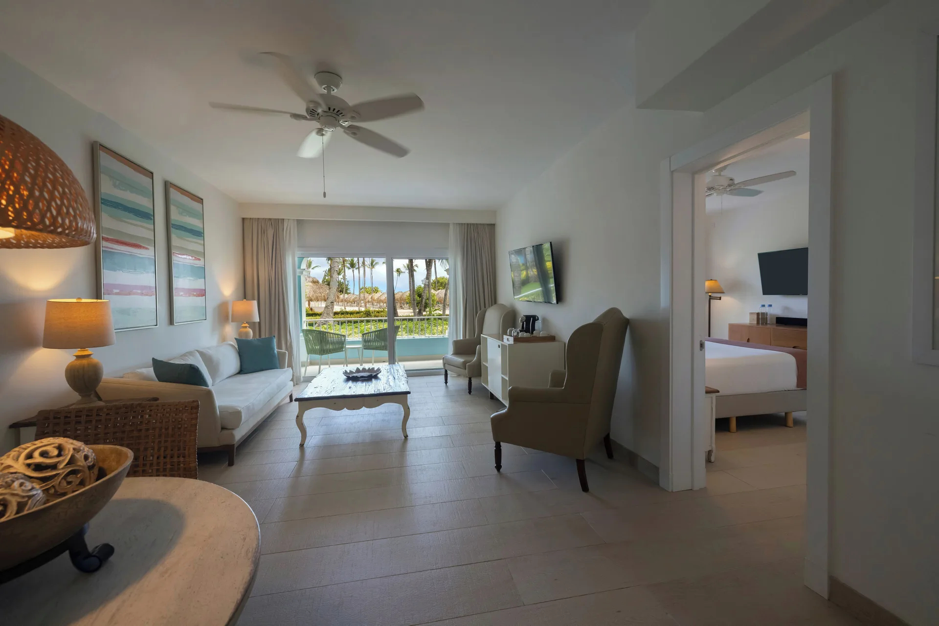 Suite lounge and adjoining king bedroom at Iberostar Selection Hacienda Dominicus.