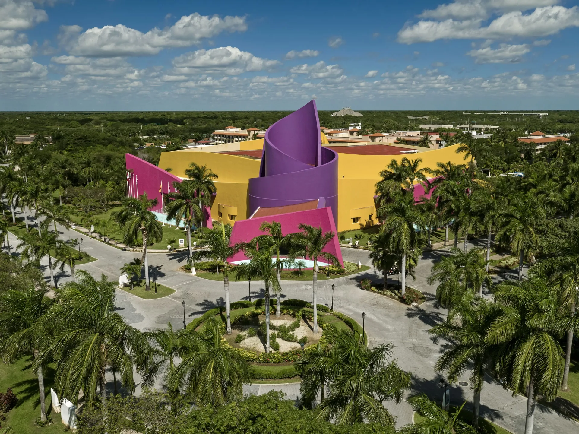 Aerial view of colorful resort building at Iberostar Selection Paraíso Lindo.