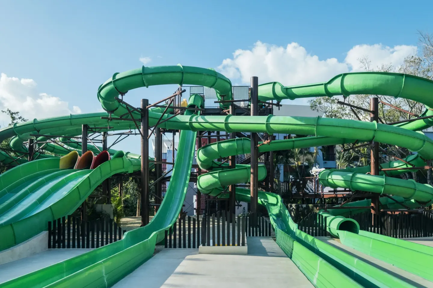 Green waterslides and splash area at Iberostar Selection Paraíso Lindo.