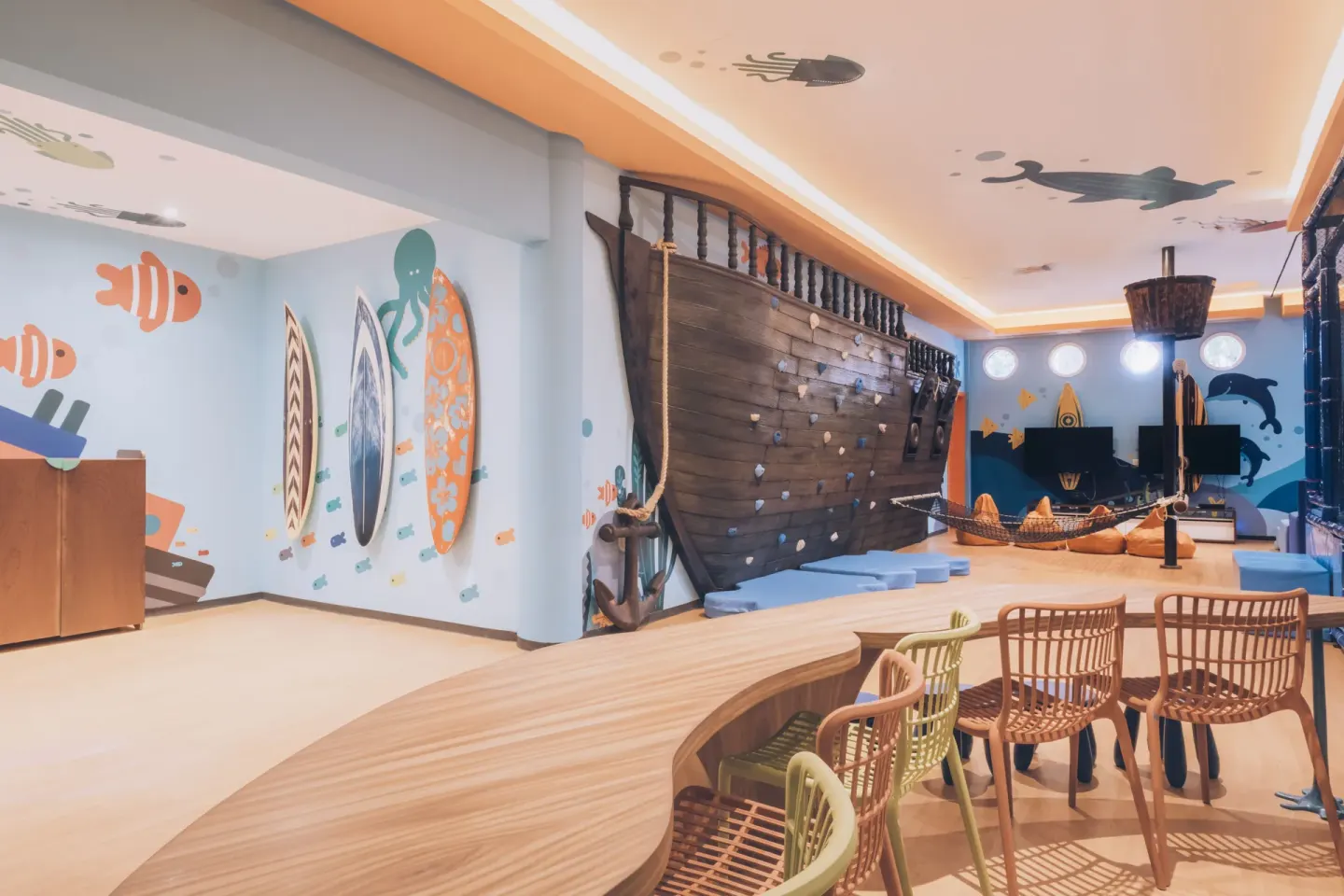 A nautical-themed children’s room with a ship play wall at Iberostar Selection Paraíso Lindo.