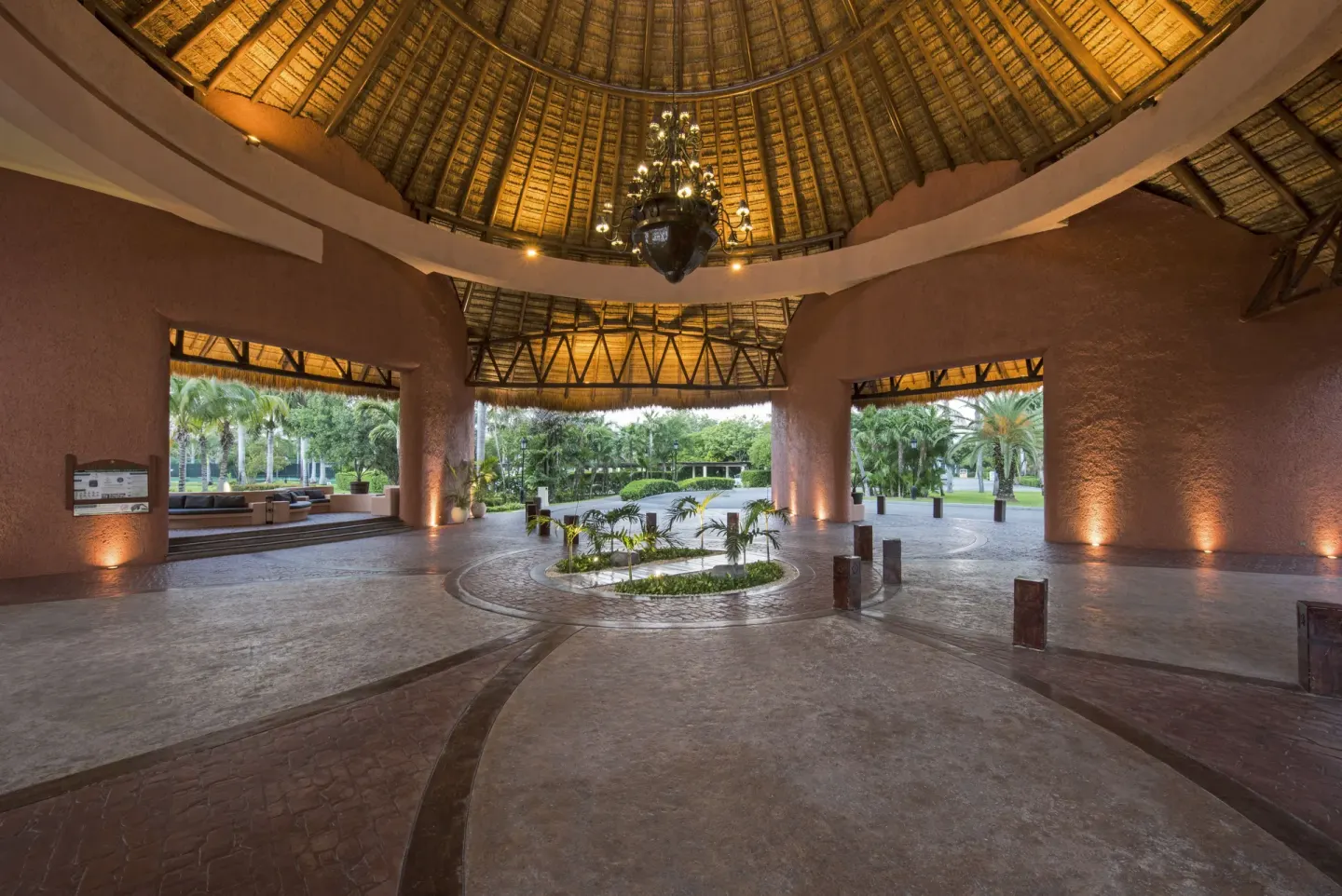 Open-air palapa lobby with garden views at Iberostar Selection Paraíso Lindo.