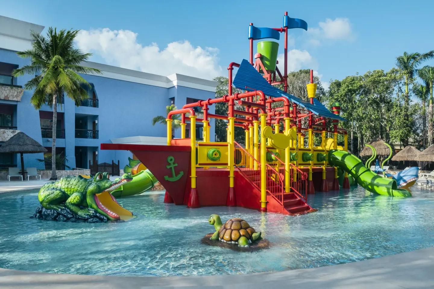 Children’s splash pool with pirate ship play structure at Iberostar Selection Paraíso Maya Suites.