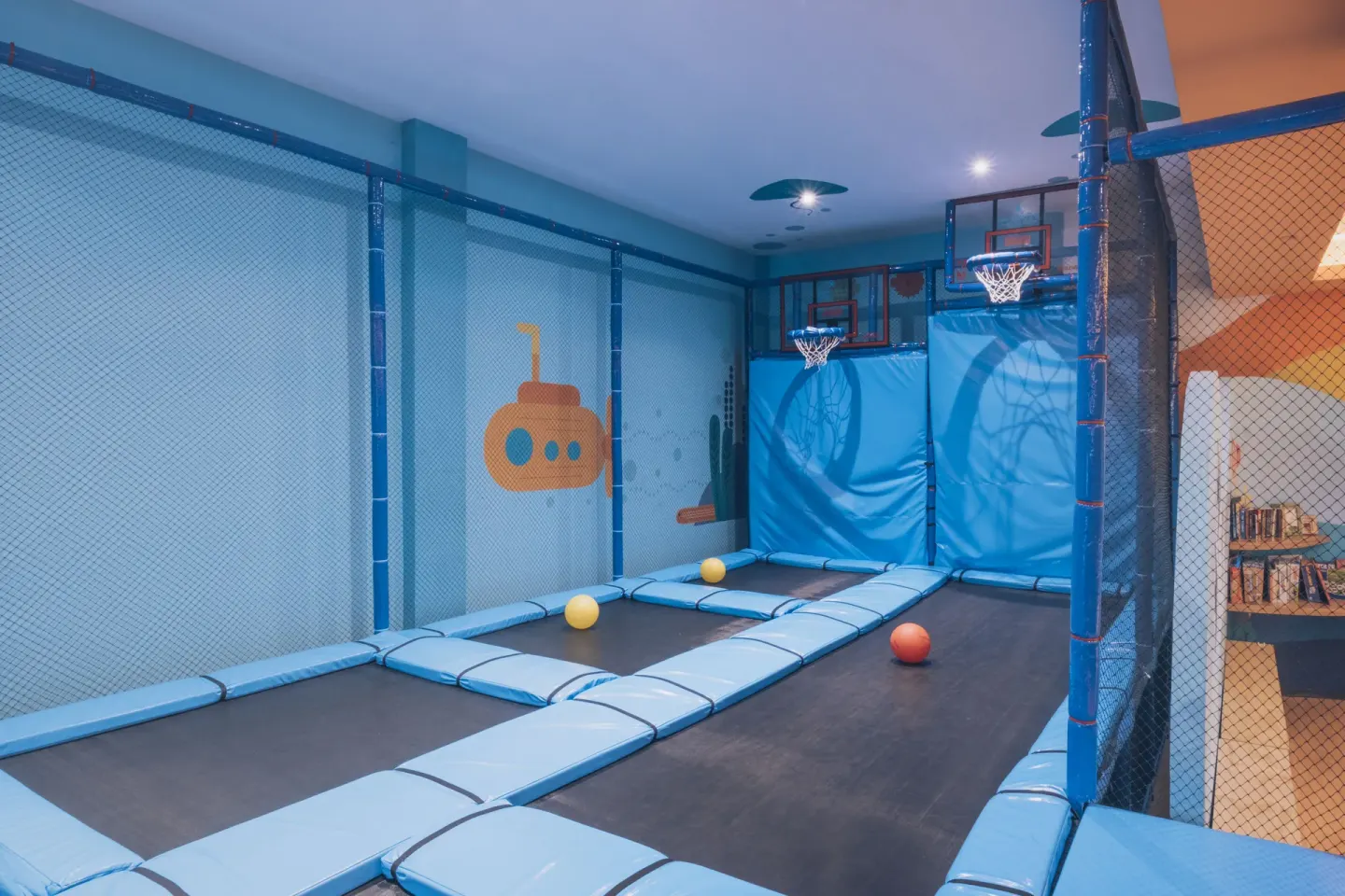 Indoor trampoline basketball court at Iberostar Selection Paraíso Maya Suites.