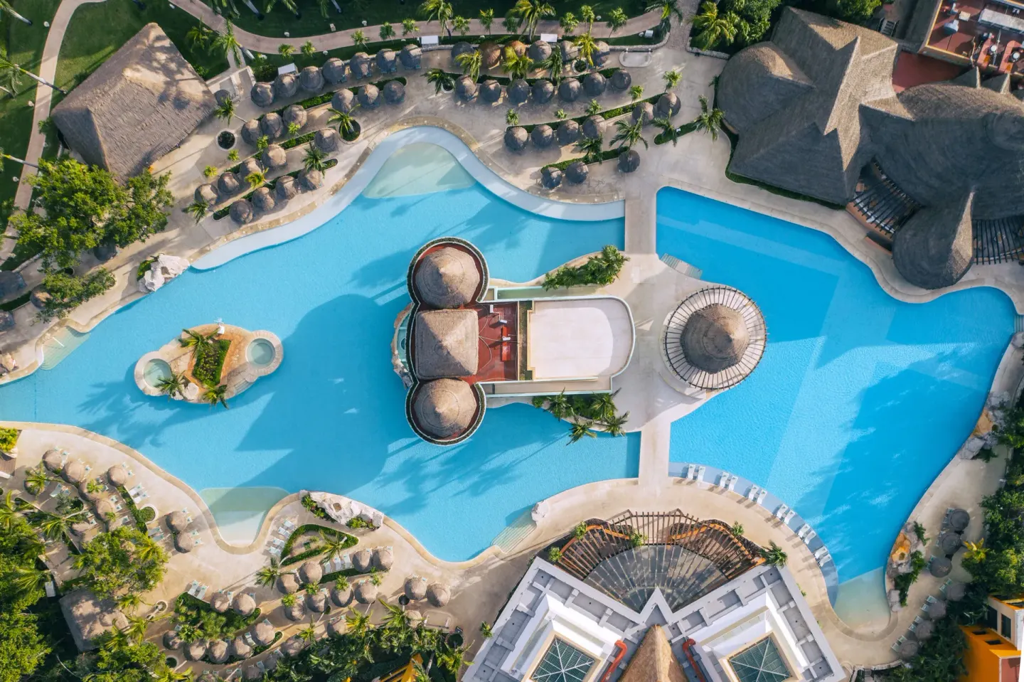Aerial view of the main pool complex at Iberostar Selection Paraíso Maya Suites.