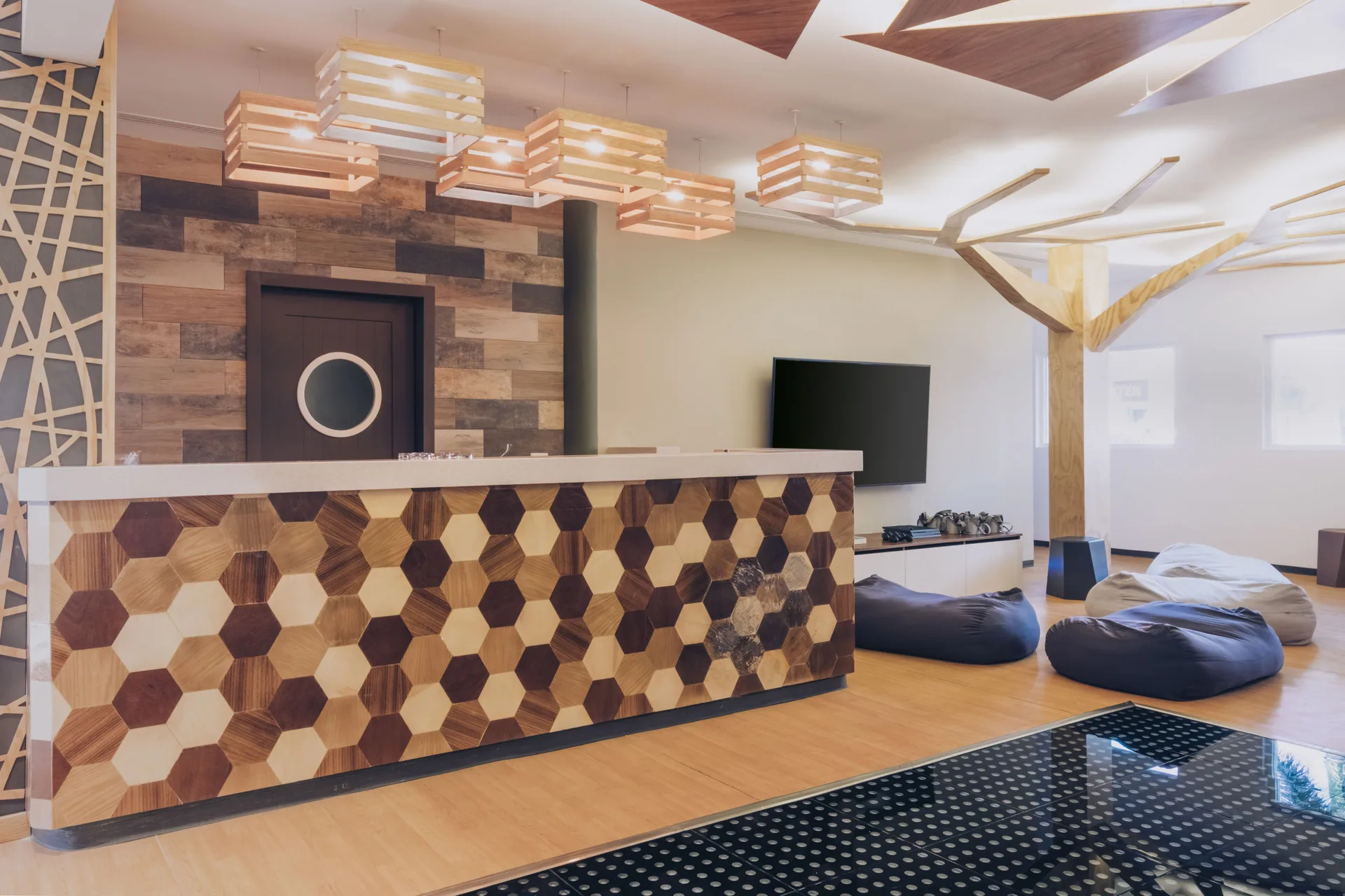 Youth lounge reception and beanbag seating at Iberostar Selection Paraíso Maya Suites.