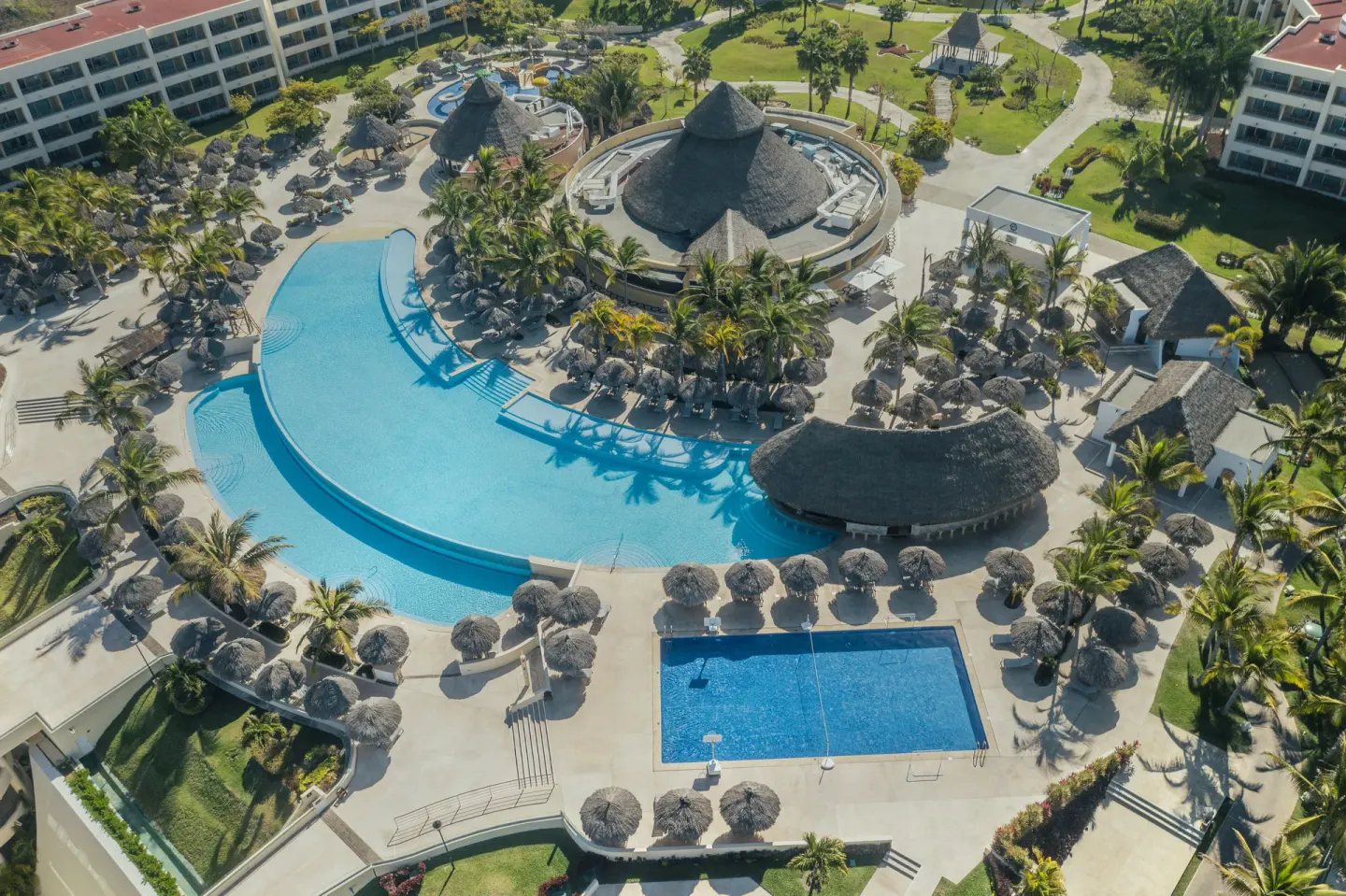 Aerial view of pools, palapas, and resort grounds at Iberostar Selection Playa Mita.