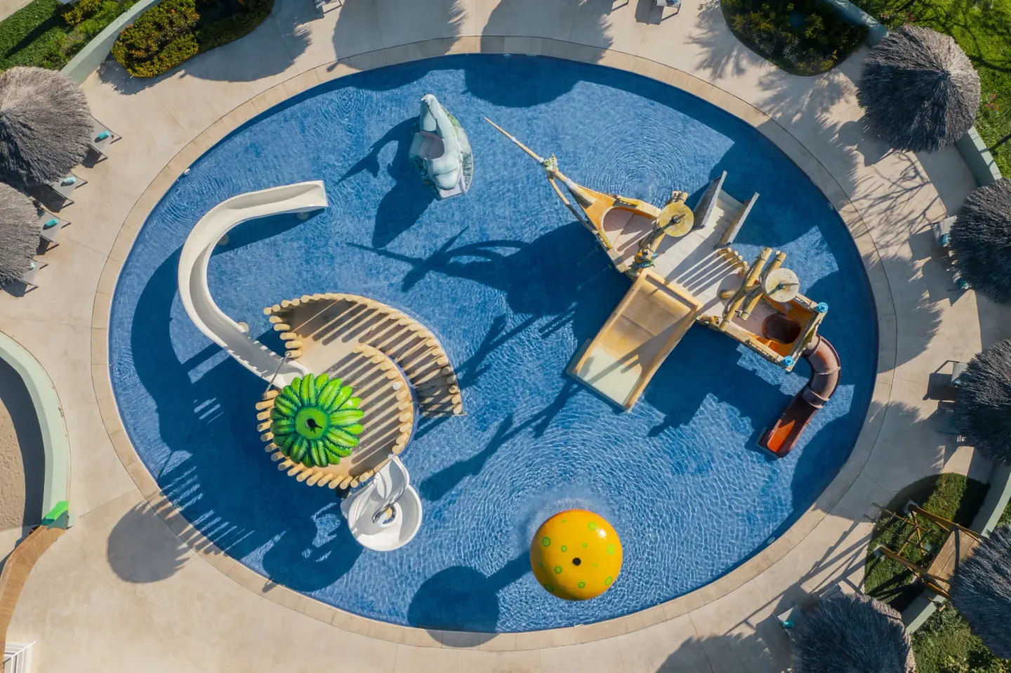 Overhead view of slides and play features in the kids’ pool at Iberostar Selection Playa Mita.