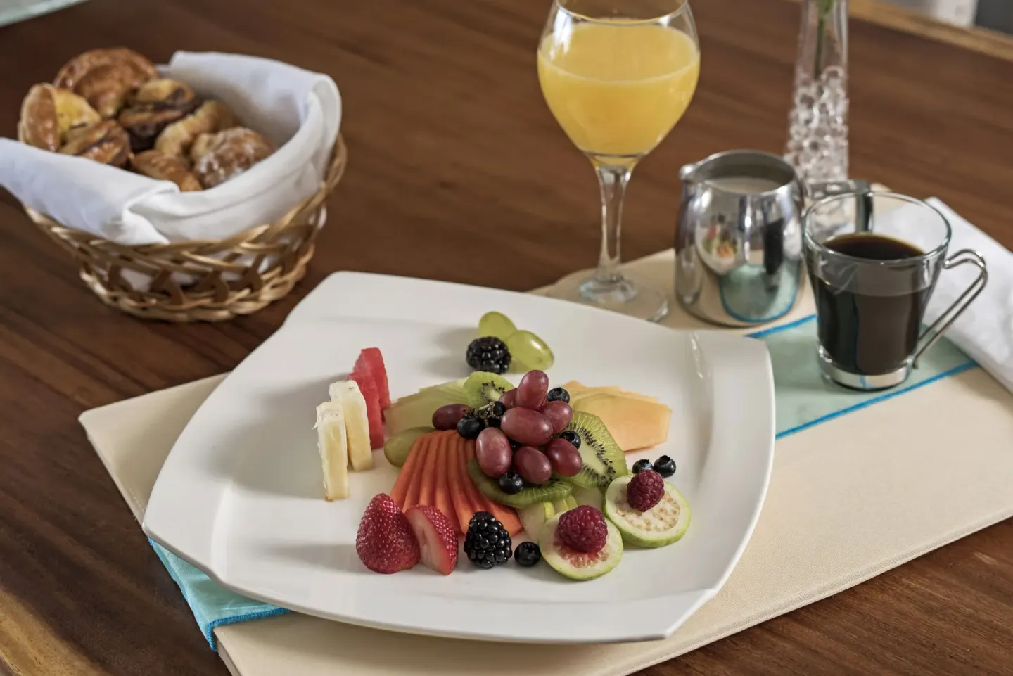 Breakfast tray with fruit, pastries, coffee and juice at Iberostar Selection Playa Mita.