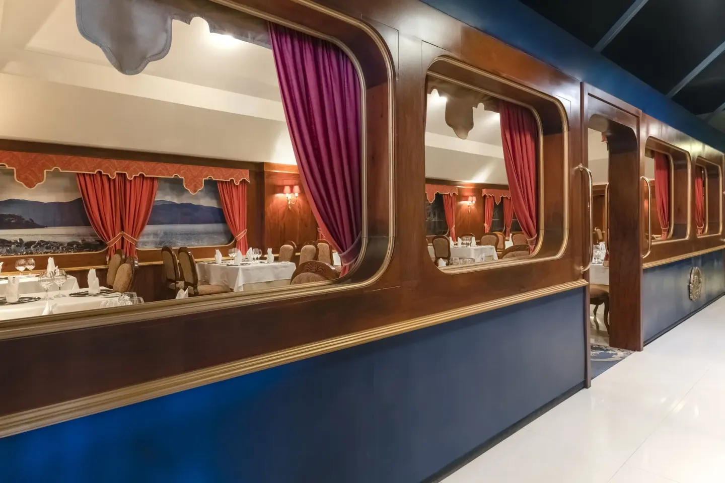 Train-car themed restaurant entrance and dining room at Iberostar Selection Playa Mita.