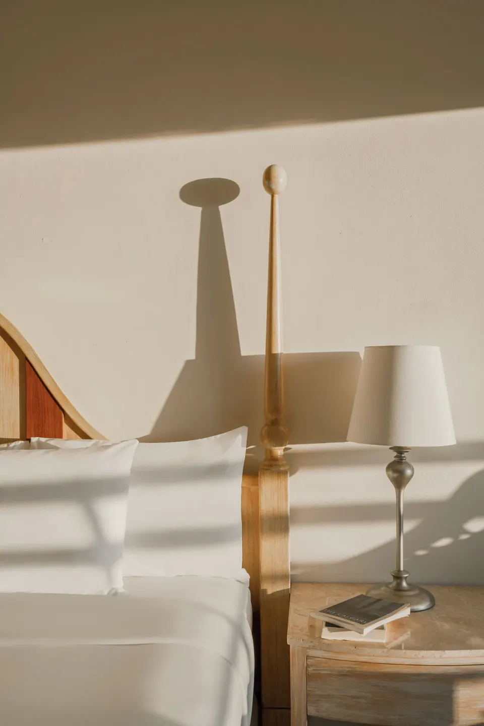 Premium Room bedside detail with king bed and lamp at Iberostar Selection Playa Mita.